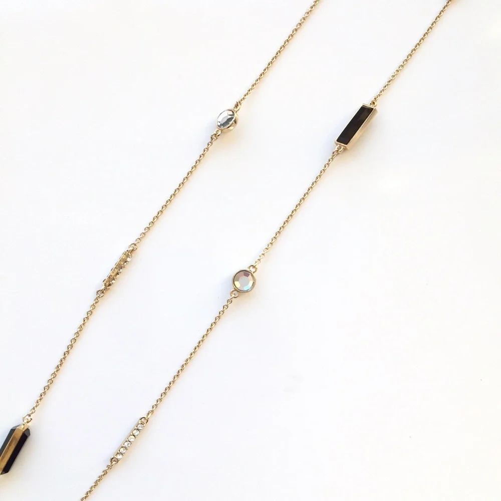 kate spade gold long station necklace with black and clear accents